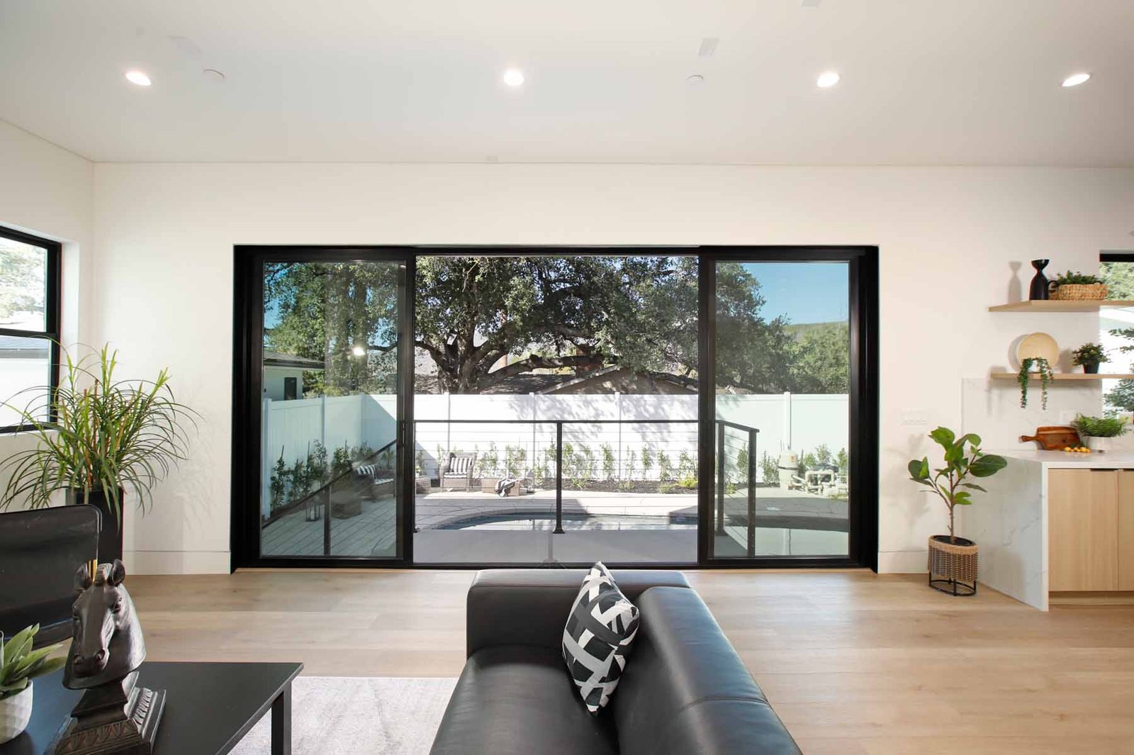 Modern Sunland living space with expansive glass doors